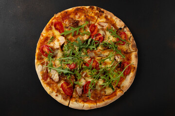Top view of Pizza with tomato sauce, fresh mozzarella, Parmesan cheese and basil.