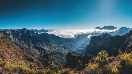 Fototapeta premium Mountainous Landscape with Clouds and Blue Sky