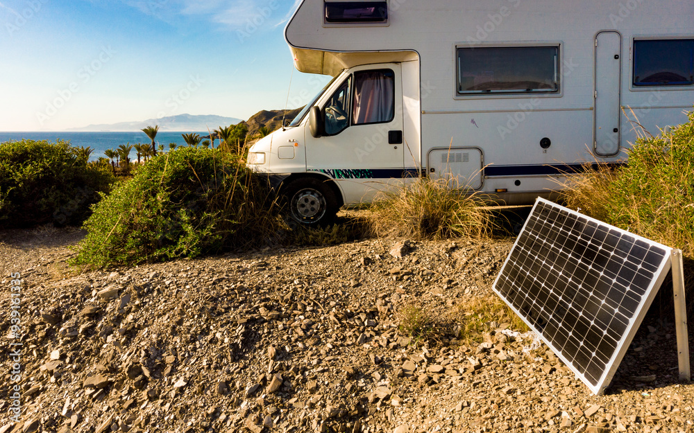 Wall mural caravan camping on sea shore, spain.