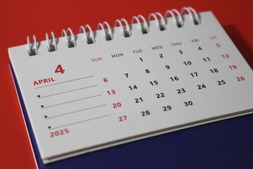 Monthly calendar template for the new year 2025 desk calendar,on red background.