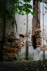 A dilapidated church. Bullet marks in the brick wall. Survived the war