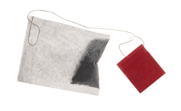 New tea bag with red tab isolated on white