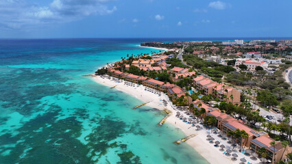 Waterfront Resort At Oranjestad In Caribbean Netherlands Aruba. Caribbean Beach. Blue Sea Background. Oranjestad At Caribbean Netherlands Aruba. Tourism Landscape. Nature Seascape.