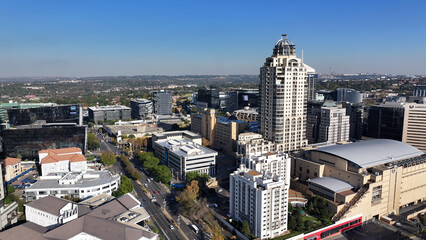 Fototapeta premium Sandton Skyline At Johannesburg In Gauteng South Africa. Sandton Landscape. Financial District Background. Johannesburg At Gauteng South Africa. High Rise Buildings. Mandela Square.