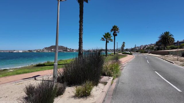 Saldanha Bay, Western Cape South Africa. 27.03.2024. Video. Grass promenade alongside the beach in Saldanha Bay on the west coast South Africa