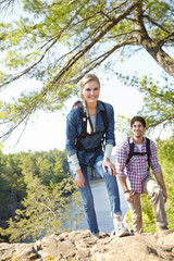 Hiking, couple and happy with portrait in nature for outdoor adventure, journey and travel together. Smile, woman and man with backpack by mountain for exploring, trekking and tourism in Argentina