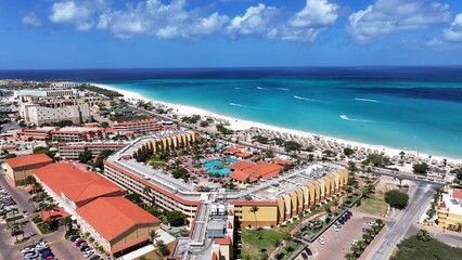 Fototapeta premium Eagle Beach At Oranjestad In Caribbean Netherlands Aruba. Caribbean Beach. Blue Sea Background. Oranjestad At Caribbean Netherlands Aruba. Tourism Landscape. Nature Seascape.