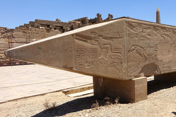 Ancient Hieroglyphs and Bas Relief at the Karnak Temple Complex in Egypt Showcasing Historical...