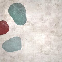 stylish textured old paper background with sea glass pebble pieces 
