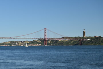 Suspension bridge crossing the river Tagus in Lisbon Portugal. The 25 de Abril Bridge. 