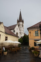 The picturesque and colorful medieval town Sibiu with a prominent place for the Sibiu Lutheran Cathedral, Sibiu, Romania