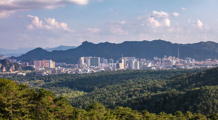 Skyline of Chengde, Hebei Province, China, summer capital of the Qing Dynasty. Located in Yanshan Mountain range, it is covered with forests and Danxia landforms.