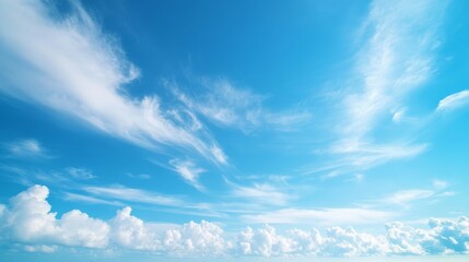 Fototapeta premium Ethereal Cloudscape Against Vast Boundless Blue Sky with Wispy Clouds