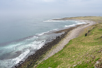 Coastal scenery over Varangerfjorden in Ekkerøy, Northern Norway.