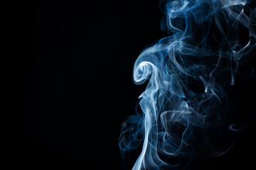 Smoke from flames or fog clouds graphic design art isolated on dark black background.
