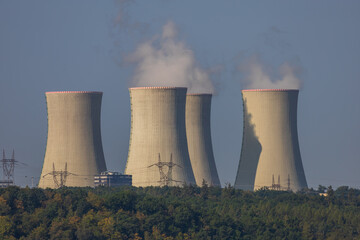 Dukovany nuclear power plant in the Czech Republic, Europe. Smoke cooling towers. There are clouds...