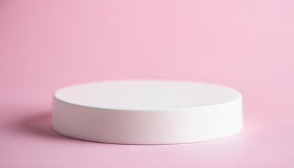 White ceramic podium. Scene for product presentation on pink backdrop.