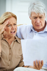 Senior couple, stress and documents at house for financial bankruptcy, payment debt and mortgage...