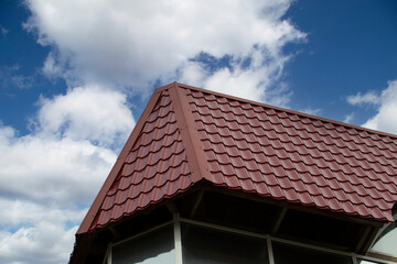 Metal tile.Roof for the house. Modern coatings for the roof of the house.