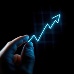 Naklejka premium A hand holding a blue arrow pointing upwards. Concept of growth and progress