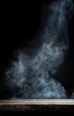 A rustic wooden table with dark smoke swirling in the background, creating a moody and mysterious atmosphere.
