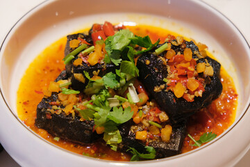 Chinese Stinky tofu. Spicy fermented tofu snack in China