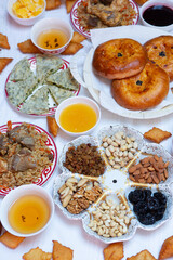 Meal with traditional Kyrgyz dishes served in the yurt. Local food in Kyrgyzstan.