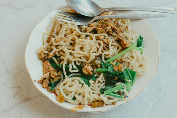 chicken noodle meatball or mie ayam bakso. popular street food in Indonesia