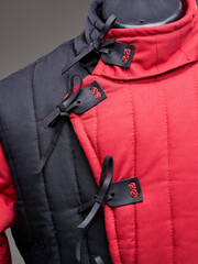 Historical fashion. Medieval knight cloth. Padded jacket gambeson.