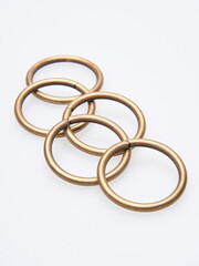 Five metal rings on the white background