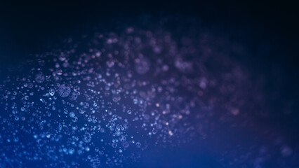 Gel fluid. Oil bubbles texture. Defocused blue purple color paint foam emulsion droplets floating on dark abstract art background.