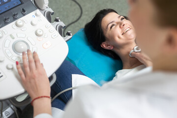 Qualified medical specialist using ultrasound equipment in the clinic