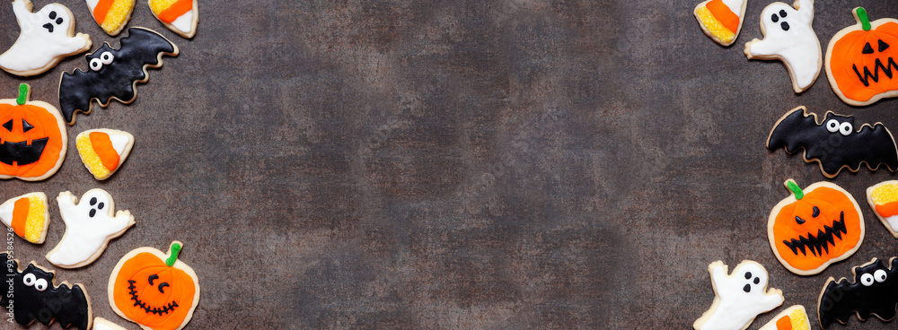 Poster halloween cookie double border. top view on a dark stone banner background with copy space. ghosts, 