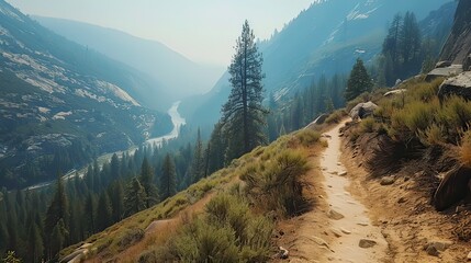 Obraz premium Hiking trail overlooking the river and valley in Yosemite National Park. 