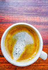 Cup of americano black coffee in restaurant cafe in Mexico.