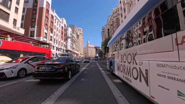 4K Time Lapse: Personal perspective POV of a man cycling his bicycle through Gran V&iacute;a street in Madrid from Plaza de Espa&ntilde;a (Spanish for Spain Square) to Fuente de Cibeles, crossing Callao Square
