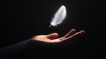 Feather falling on outstretched hand surrounded by black.