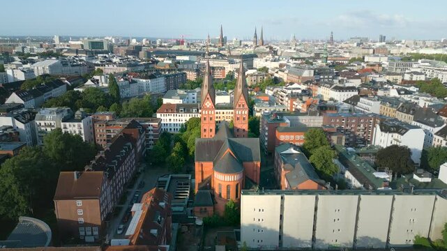 Hamburg city skyline fly over 
Catedral de Santa Mar&iacute;a Domkirche St. Marien (English: St. Mary's Cathedral) is a Roman Catholic cathedral in Sankt Georg, Hamburg, Germany in front old town town hall.