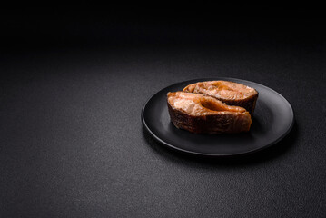 Delicious red salmon r trout fish grilled with spices and herbs