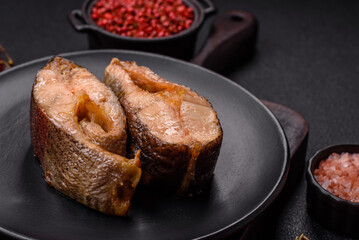 Delicious red salmon r trout fish grilled with spices and herbs