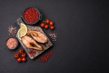 Delicious red salmon r trout fish grilled with spices and herbs