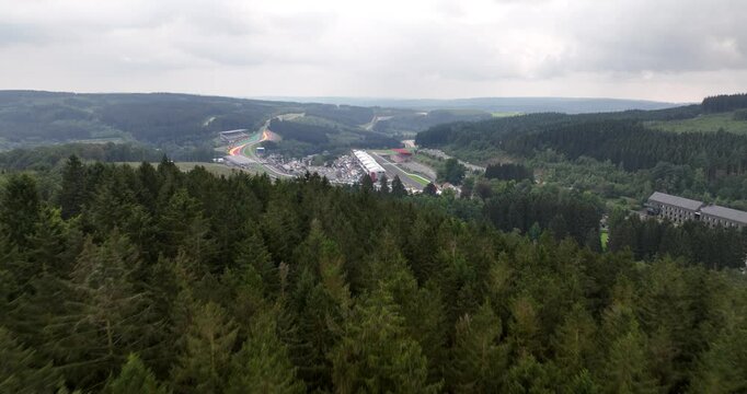 Revealing aerial drone video over the Spa Francorchamps race track circuit in the Belgium ardennes, Stavelot.