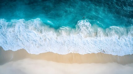 Fototapeta premium Aerial View of Turquoise Waves Crashing on Sandy Beach 