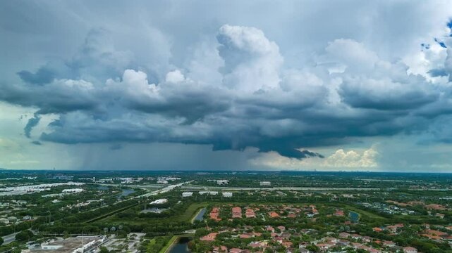 Aerial Time lapse of storms rolling through over South Florida during summer Hurricane season