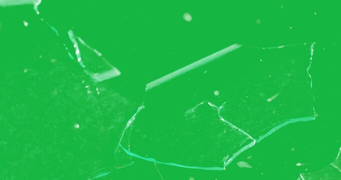 Glass Shattered and Breaks with Bullet Hit, isolated on Green Screen Background,4K Video Element