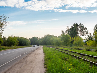 highway and railway tracks and rails along road