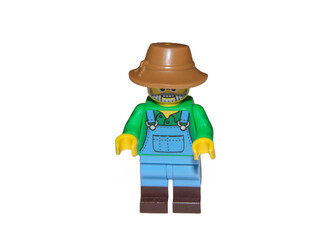 Fototapeta premium Baia Mare, Romania - June 26 2022: Farmer lego toy isolated on white background