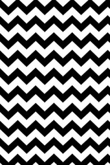 Classic black and white zigzag pattern on a textured background