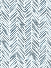 Blue and white herringbone pattern design on a textile background