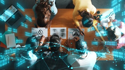 Top view of skilled business team put graphic logo on meeting table with colorful sticky notes and start to design while explain idea. Smart project manager explain about financial graph. Symposium.